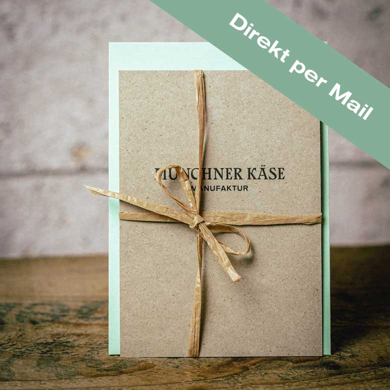 Ein Graspapier-Gutschein ist zu sehen. Eine Schrift sagt, dass der Gutschein direkt per E-Mail verschickt wird.