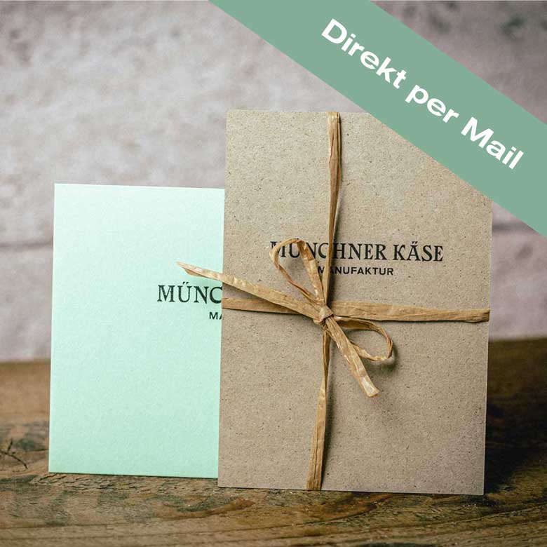 Ein Graspapier-Gutschein ist zu sehen. Eine Schrift sagt, dass der Gutschein direkt per E-Mail verschickt wird.